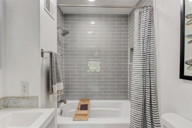 bathroom with toilet and shower / bath combination with curtain