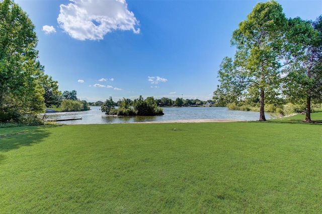 exterior space with a water view