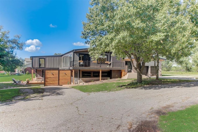 view of front of property with a deck