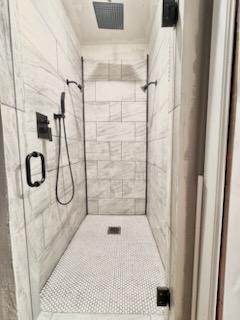 bathroom featuring walk in shower