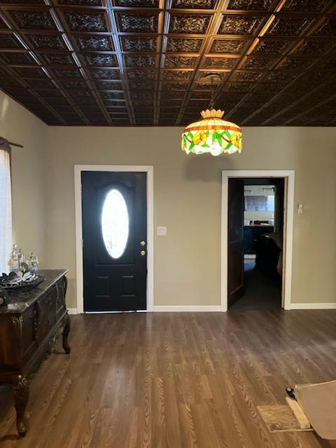 foyer featuring wood-type flooring