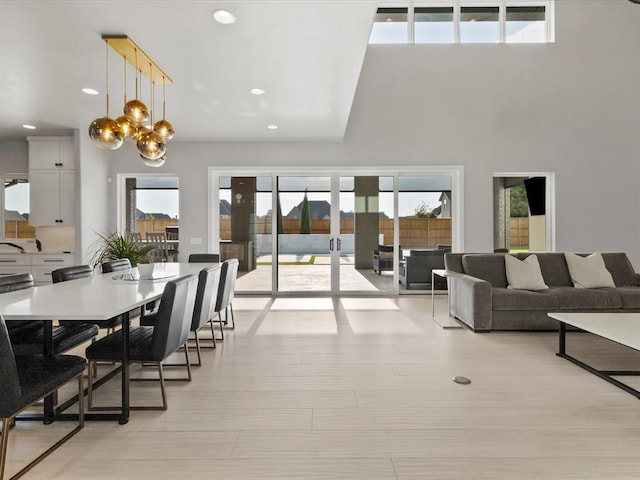 dining space with light hardwood / wood-style flooring