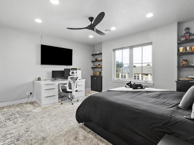 bedroom with light carpet and ceiling fan