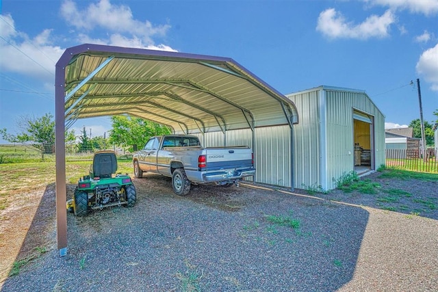 view of car parking featuring a carport