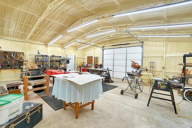 garage with a workshop area