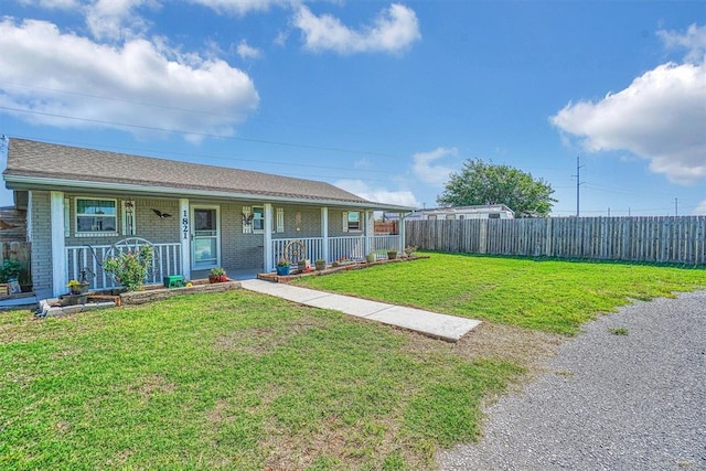 single story home with a front yard and a porch