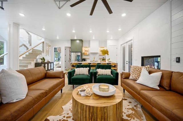 45 Pecan Trace Trl, Broken Bow, OK 74728 - living room featuring ceiling fan, light hardwood / wood-style flooring, and french doors