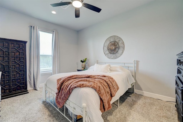 carpeted bedroom with ceiling fan