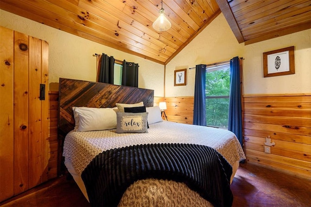 bedroom featuring lofted ceiling, wooden ceiling, and wooden walls