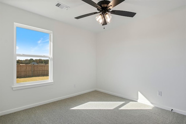 carpeted empty room with ceiling fan