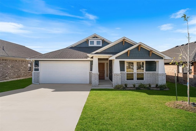 craftsman-style home featuring a garage and a front yard