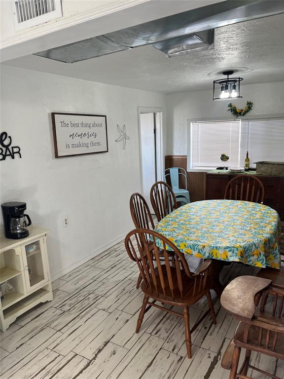 dining area with light hardwood / wood-style flooring