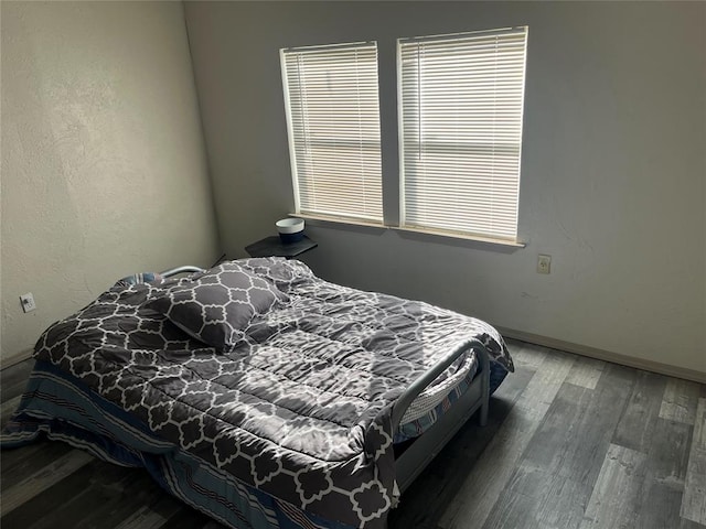 bedroom featuring hardwood / wood-style floors