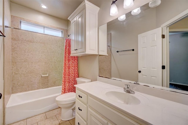 full bathroom with tile patterned floors, vanity, toilet, and shower / bath combo