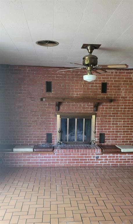 view of patio with ceiling fan