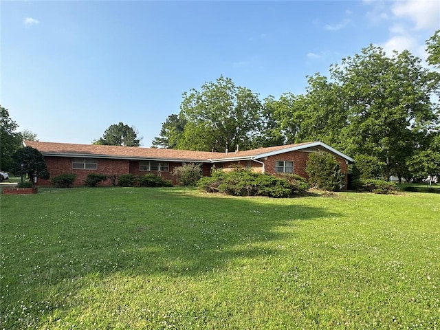 view of front of home with a front yard