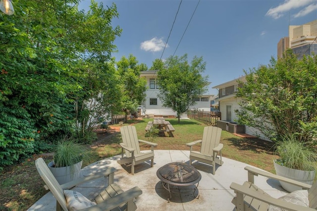 view of patio / terrace with a fire pit