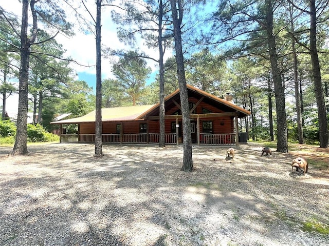 view of log-style house