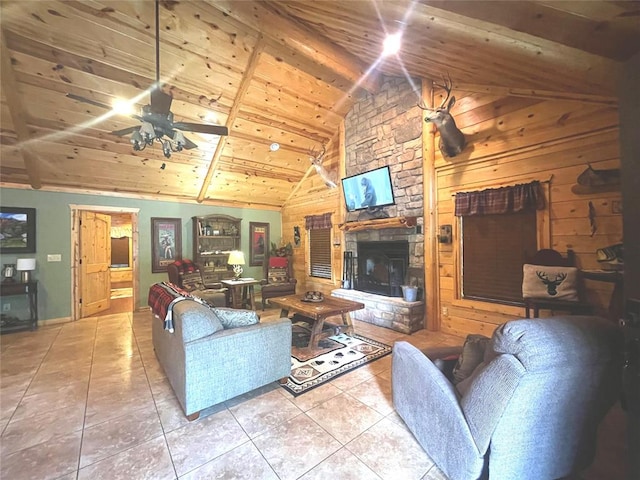 living room with wood walls, tile patterned floors, lofted ceiling with beams, ceiling fan, and wood ceiling