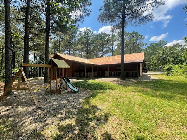 view of play area featuring a yard