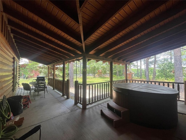 view of patio / terrace featuring a hot tub