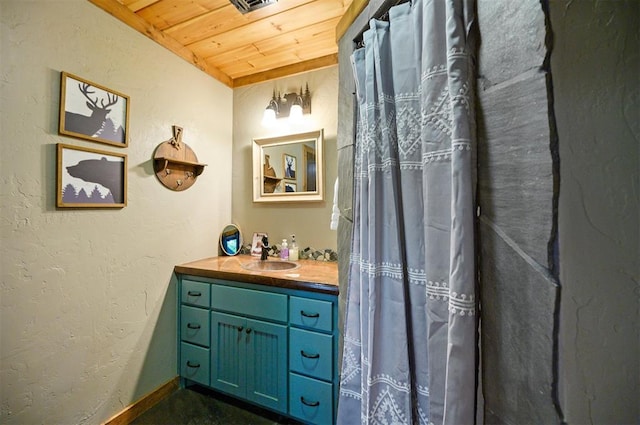 bathroom featuring vanity and wooden ceiling