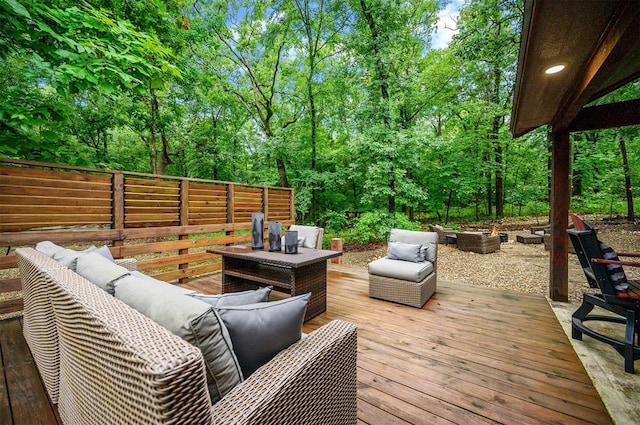 wooden terrace featuring an outdoor living space