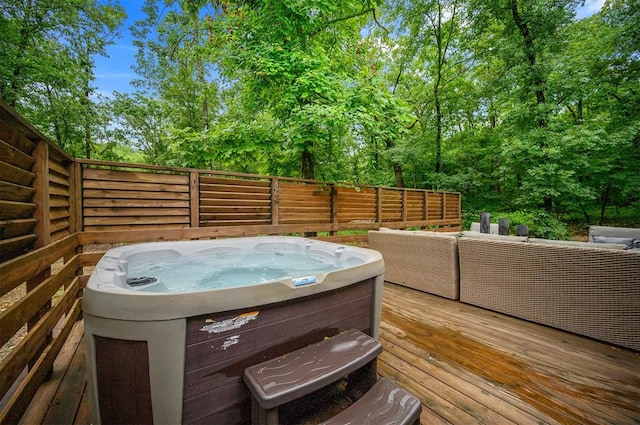 exterior space with a hot tub