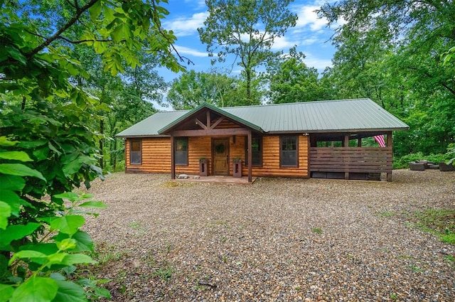 view of log cabin