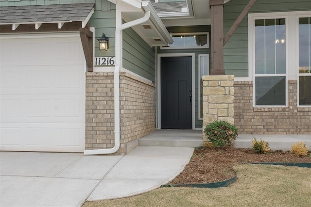 property entrance featuring a garage