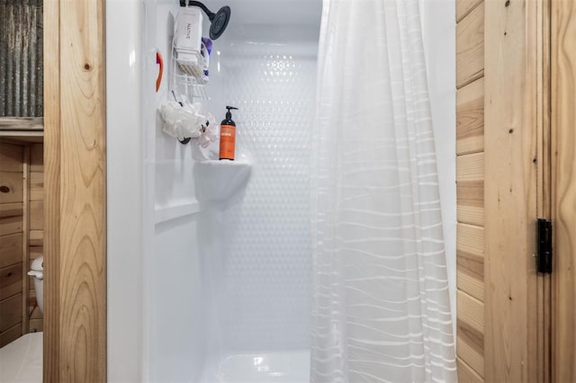 bathroom with a shower with shower curtain