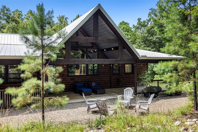 back of house featuring a patio