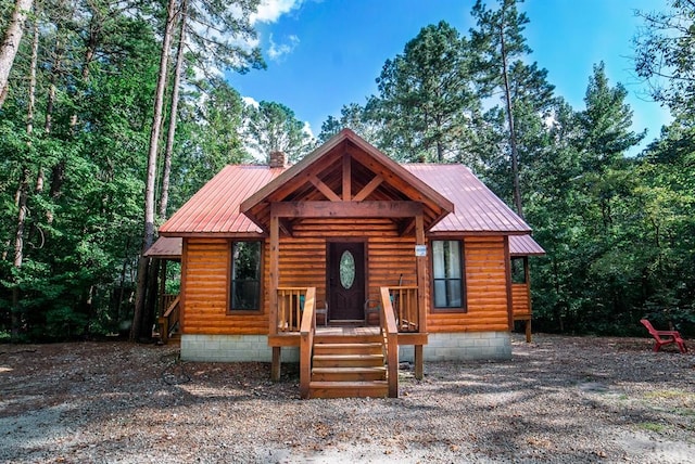 view of log cabin