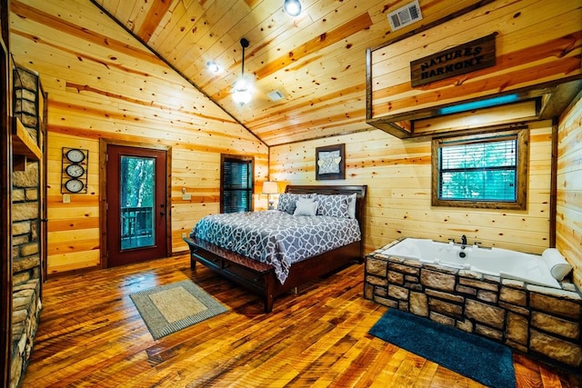 bedroom with hardwood / wood-style flooring, high vaulted ceiling, wooden walls, and wood ceiling