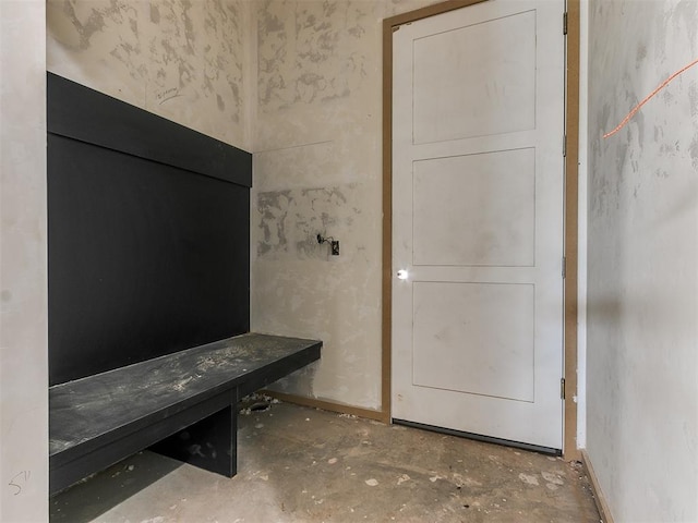 mudroom with concrete flooring