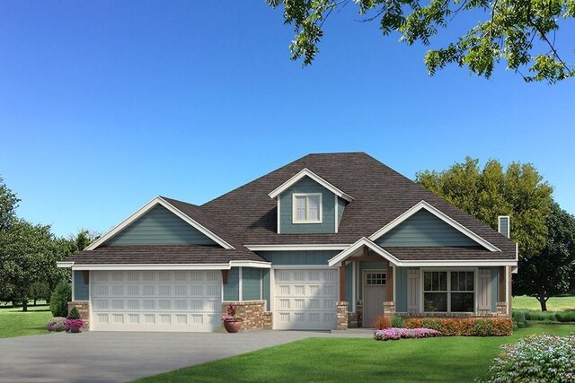 craftsman-style house featuring a garage and a front lawn