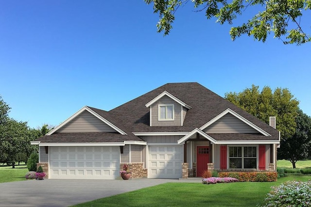 craftsman house featuring a front lawn and a garage