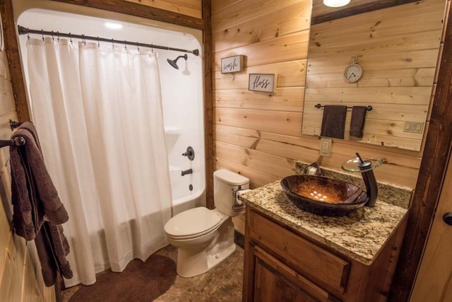 full bathroom featuring toilet, shower / bathtub combination with curtain, wooden walls, and vanity