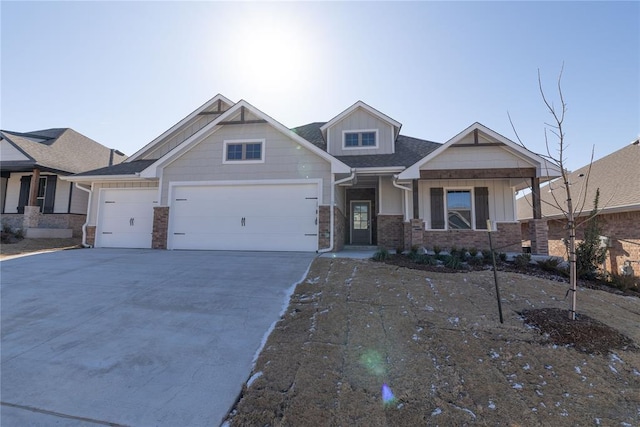 craftsman-style house featuring a garage and covered porch