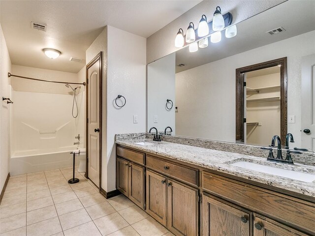 9500 S Brookline Ave, Oklahoma City, OK 73159 - full bathroom featuring tile patterned flooring, a sink, visible vents, and double vanity