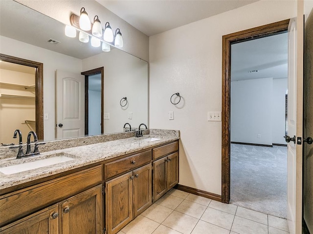 9500 S Brookline Ave, Oklahoma City, OK 73159 - full bath with tile patterned flooring, a sink, visible vents, and double vanity
