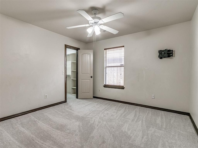 9500 S Brookline Ave, Oklahoma City, OK 73159 - empty room featuring carpet floors, a ceiling fan, and baseboards
