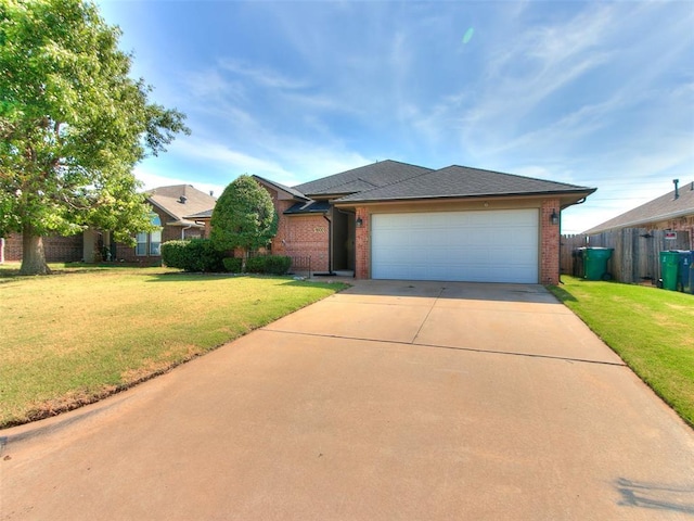 9500 S Brookline Ave, Oklahoma City, OK 73159 - ranch-style home with concrete driveway, a front lawn, an attached garage, fence, and brick siding