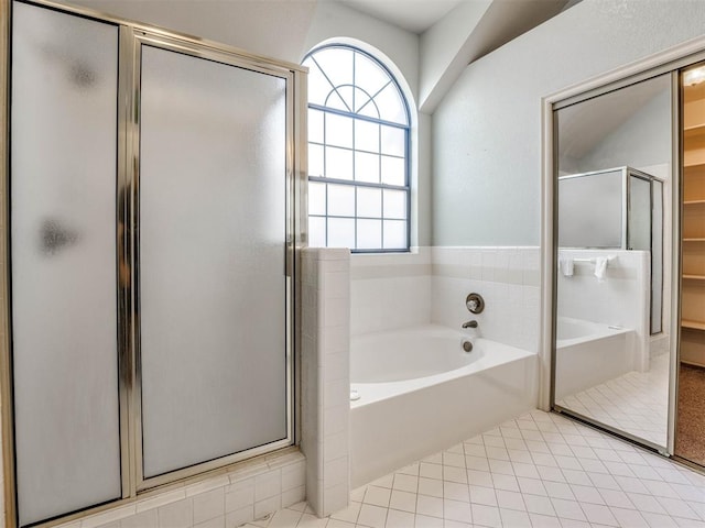 bathroom featuring separate shower and tub and tile patterned flooring