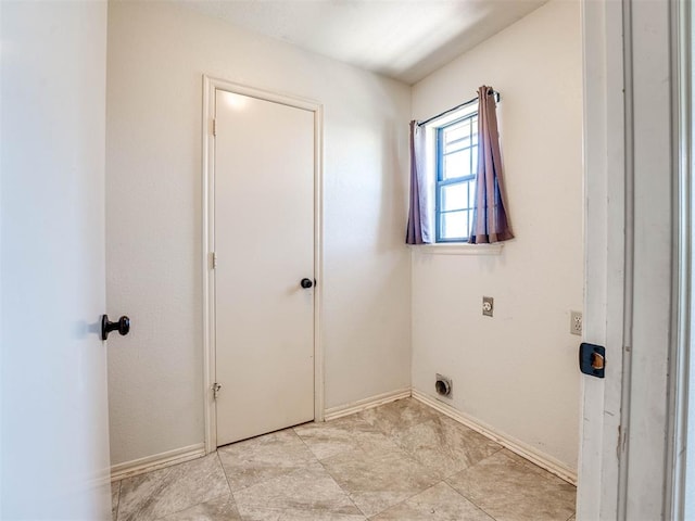 clothes washing area featuring electric dryer hookup