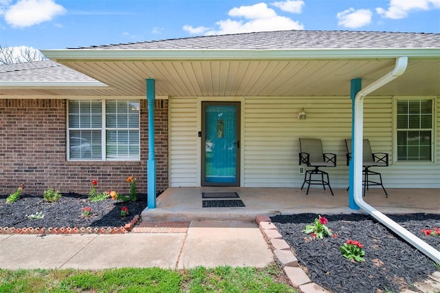 entrance to property with a porch