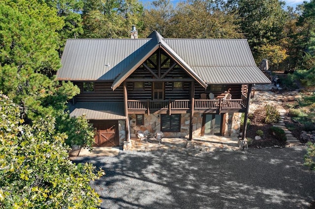 view of log cabin