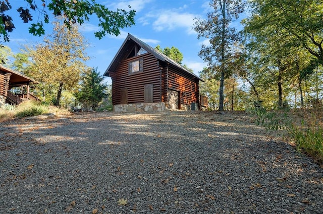 view of home's exterior with central AC unit