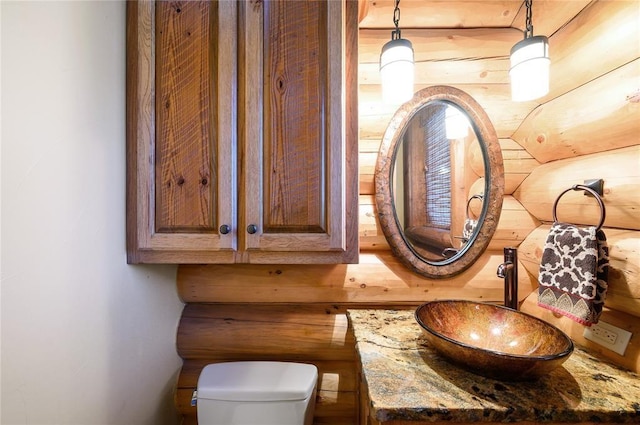 room details featuring sink and toilet