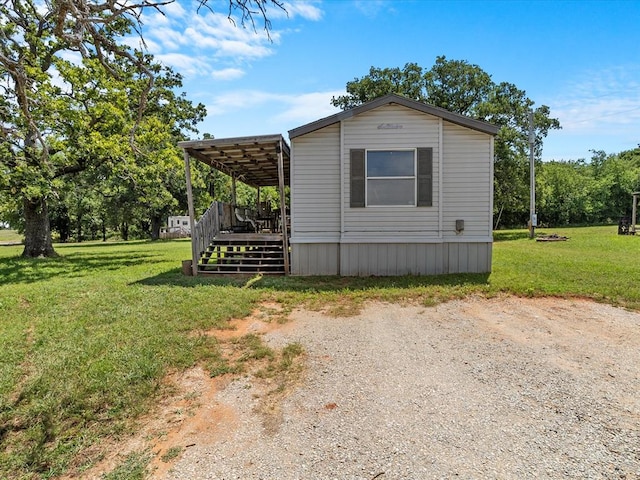 view of home's exterior featuring a lawn